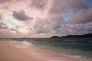 Indian Ocean towards Aride and Praslin islands at twilight Indian Ocean Islands,landscape,shore,waves,twilight,sunset,clouds