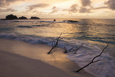 Indian ocean and 'Roche Canon' island at sunset Indian Ocean Islands,landscape,shore,waves,twilight,sunset,clouds