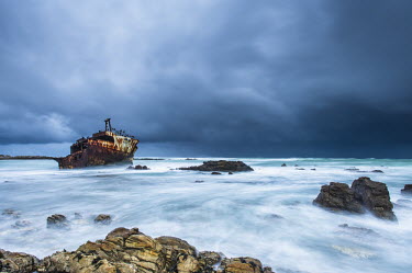 Severe winters storm lashing the southern tip of Africa's coastline with a shipwreck in the foreground, Beauty in nature,Coastline,Outdoors,South Africa,Western Cape,africa,african,agulhas national park,cape of storms,climate change,cold front,color image,colour image,day,image,meiso mero,moddy sky,natu