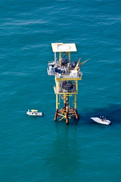Island of steel serving as a habitat for a very large variety of reef and pelagic fish fishing,gulf,nature,conservation,issue,marine life,protection,offshore,oil rig,platform,oil,structure,artificial reef
