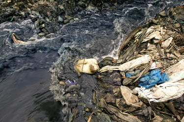 Conservation Issues: polluted river in central Nairobi Africa,conservation,conservation issue,conservation issues,water,urban,village,waterway,waterways,polluted,pollution,slum,stream,dirt,dirty,filth,filthy,rubbish,plastic pollution,plastic,plastic bag,p