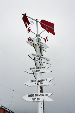 Signpost showing direction and distance to other research bases science base,science,climate change,global warming,cold,freezing,frozen