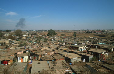 View of informal settlement/slum area - Johannesburg, South Africa Aerial,Informal settlement,Improvisation,Roofs,Rooftops,Colourful,Environment,Outside