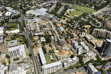 Aerial view of a city building site - Johannesburg, South Africa Aerial,Building site,Crane,Building,Renovation,New,Road,City,Suburb