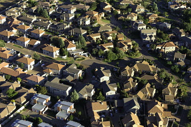 Aerial view of Johannesburg suburbs - Johannesburg, South Africa Aerial,Landscape,City,Suburbs,Road,Buildings,Houses,Neighbourhood,Trees,Rooftops,Settlement,Tree-lined