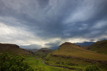 Scenery of Giants Castle Nature Reserve under dramatic skies - South Africa Africa,African,Southern Africa,scenic,scenery,beauty in nature,natural world,non-urban scene,nature,outdoors,sky,cloud formation,dramatic sky,mountains,landscape,green,grass