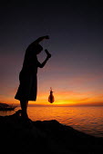 Fisherfolk using traditional fishing method.