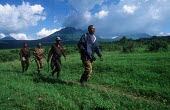 Park guards patrolling boundary of Virunga National Park Martin Harvey people,Africa,armed,camouflage,Central Africa,conservation,day,ranger,firearm,firearms,guard,guards,gun,guns,male,man,patrol,patrolling,patrols,rifle,security staff,weapon,weaponry,weapons,poaching,poacher,wildlife crime,illegal wildlife trade,trafficking,elephant,rhino,Congo,Democratic Republic of the Congo,landscape