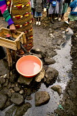 Conservation Issues: water source in slum Africa,conservation,conservation issue,conservation issues,water,clean water,drinking water,collect,collecting,urban,village,people,waterway,waterways,polluted,pollution,source,water source,slum
