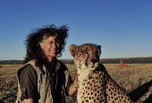 Laurie Marker, Director of The Cheetah Conservation Fund with a cheetah Africa,conservation,conservation action,research,big cat,big cats,mammals,people,rescue,Cheetah Conservation Fund,domesticated,habitat,plains,close up,close-up,Chordates,Chordata,Carnivores,Carnivora,