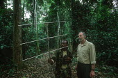 Dr Michael Loomis and field assistant Louis Desire using radio tracking equipment to monitor forest elephants Africa,conservation,conservation action,research,researcher,elephants,African elephants,Loxodonta africana,forest,rainforest,National Park,protected area,study,radio tracking,radio-tracking,radio tran
