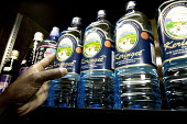 Conservation Issues: bottled water available for sale Africa,conservation,conservation issue,conservation issues,water,clean water,drinking water,bottle,bottled,bottled water,plastic bottles,sale,shop,shelf,urban,people,hand,Keringet,still water,Ribena
