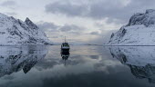 Light & Water Lofoten,Nordland,Norway,winter,fishing,vessel,boat,ship,calm,water,reflection,reflections,mountains,snow,sky,fishery,ripple,snowy,ice,fishing boat,human,Lofoten_Norway,Winter
