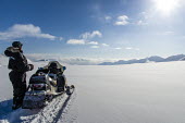 Skidoo Svalbard,Arctic,people,skidoo,snow,landscape,blue sky,sun,sunny,mountains