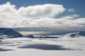 Light & Land Svalbard,Arctic,landscape,snow,light,white,snowscape,mountains,valley,clouds,blue sky,shadow,sea