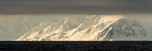 Svalbard landscape Svalbard,landscape,sea,ocean,grey,black and white,light,sunlight,panorama,clouds,mountains,snow,contrast,Arctic