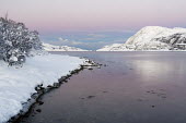 Tromso landscape Troms,Tromso,winter,water,lake,snow,Norway,mountains,mountain,landscape,clouds,still,calm,pink,white