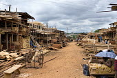 MonteÌe Parc Wood Market africa,people,man,men,horizontal,timber,market,markets,commercial,cameroon,yaounde,wood market,seller,work,wood,deforestation