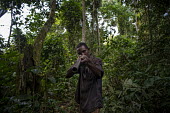 Hunters in the Tumba-Ledima Reserve Center for International Forestry Research (CIFOR) africa,people,man,horizontal,forest,hunting,environment,hunter,hunters,congo,forests,rainforest,rainforests,drc,rdc,democratic republic of congo,tumba lediima reserve,hunters tools,gun,barrel,armed,pointed at camera,livelihood