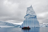 Iceberg viewed by tourists iceberg,ice,snow,cold,snowy,cold weather,winter,Christmas,freezing,frozen,landscape,habitat,climate change,global warming