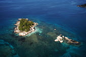 Aerial view of Coco Island - Seychelles. beaches,Beach,reef,Coral reef,tropics,tropic,reefs,corals,tropical,coral structure,coral,coral reefs,shoreline,Shore,sea shore,shoreland,sea side,Tropical,saltwater,Marine,saline,environment,ecosystem