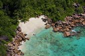 Aerial view of Praslin island - Seychelles tropics,Tropical,beaches,Beach,coast,Coastal,coast line,coastline,shoreline,Shore,sea shore,shoreland,sea side,reef,Coral reef,tropic,reefs,corals,tropical,coral structure,coral,coral reefs,environmen