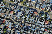 Aerial view of an informal settlement on the Cape Flats - Western Cape Province, South Africa Martin Harvey Aerial,Informal settlement,Improvisation,Roofs,Rooftops,Colourful,Environment,Outside,Pattern,Order,Blocks,Square