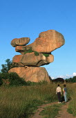 Balancing rocks with tourists looking up - Harare, Zimbabwe Tourist,Rock formation,Path,Viewing,Ancient,Natural