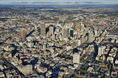 Aerial view of Johannesburg city centre with highrise buildings in the background - Gauteng Province, South Africa Aerial,Skyline,City,High-rise,Pattern,Order,Block,Mountain,Urban sprawl,Tarmac,Road,Suburb