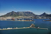 Aerial view of Table Bay working harbour with Table Mountain and Devilâs Peak in the background - Cape Town, South Africa