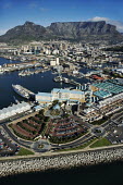 Aerial view of the Victoria & Alfred Waterfront with Table Mountain and Devil's Peak in the background - Cape Town, South Africa Aerial,Landscape,Harbour,Working port,Industry,Land management,Sea,Ocean,City,Boats,Table Mountain,Mountains,Skyline