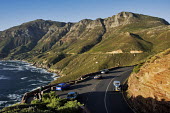 Aerial view of Chapmanâs Peak Drive, steep cliffs fall into the Atlantic Ocean right next to the scenic drive - Western Cape Province, South Africa Coast,Road,Winding,Car,Rocky,Cliff,Mountain,Hills,Ocean,Sea,Viewpoint