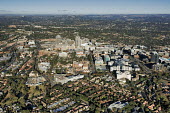 Aerial view of Sandton City and the Michelangelo Towers - Gauteng Province, South Africa Aerial,Skyline,City,High-rise,Pattern,Order,Block,Mountain,Tarmac,Road,Suburb,Towers,Tree-lined