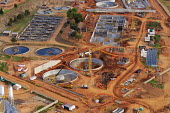 Aerial view of industrial development - Johannesburg, South Africa Aerial,Heavy industry,Land,Brown,Environmental issues,Fuel,Environment,Development,Crane,Building material